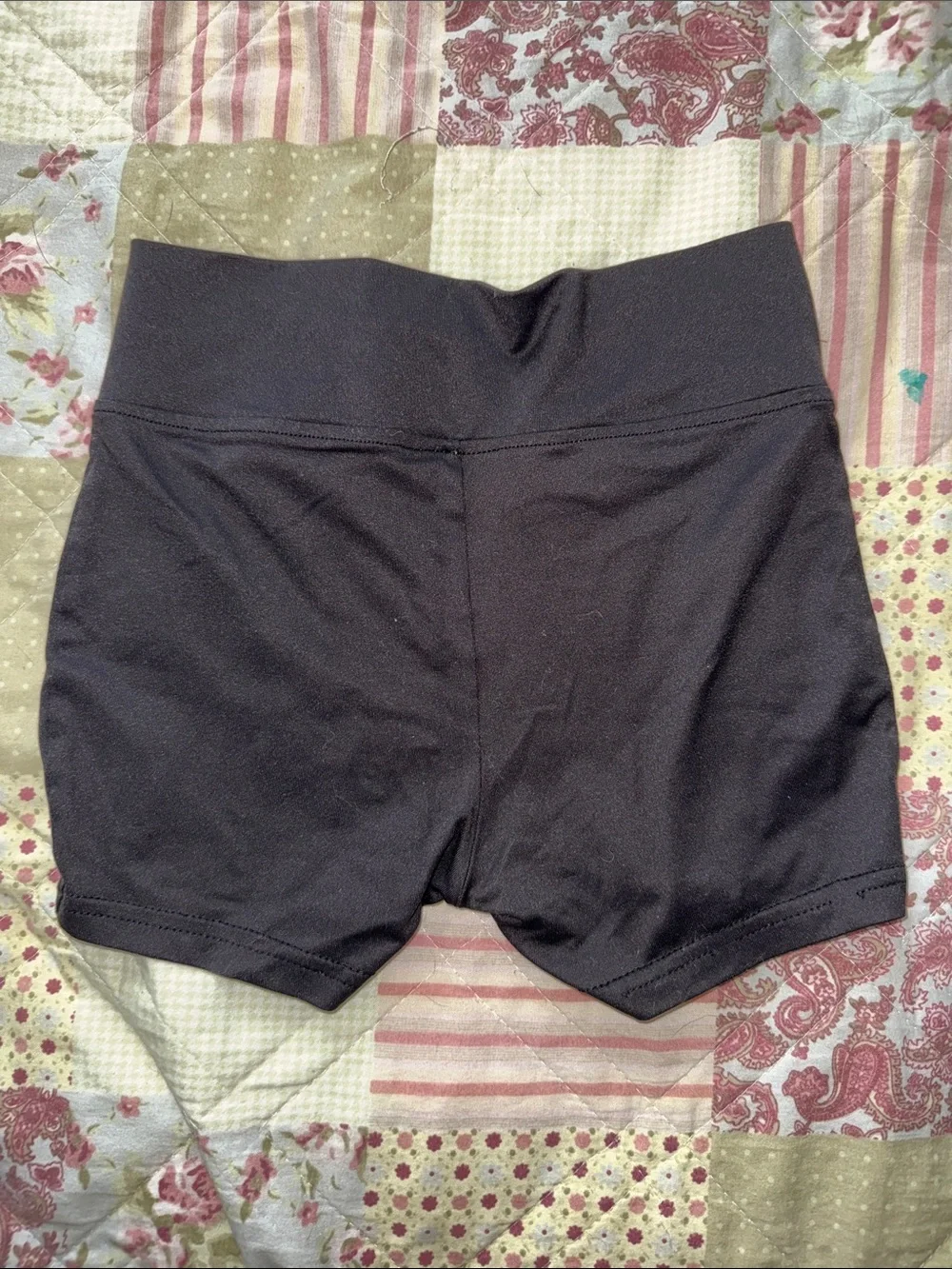 Justice Black Cross-Waist Bike Shorts with Gold Logo